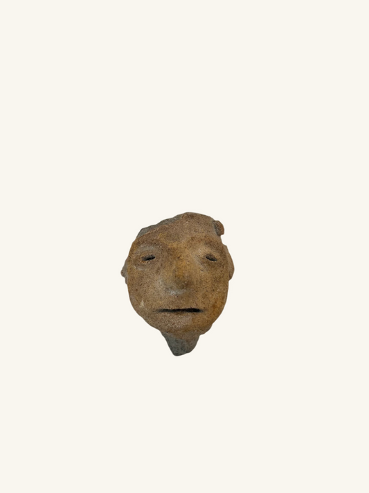 Pre-Colombian style Stone Faces