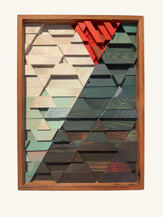 Geometric wooden art piece with a wooden frame on a beige background